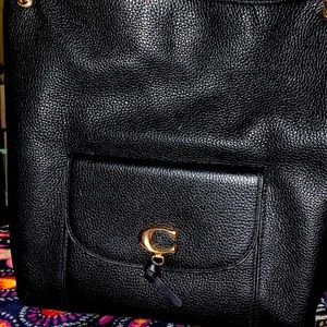 Coach bag is new and never worn.